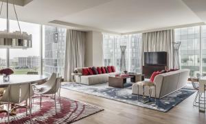 a living room with a couch and a table at Hyatt Regency Tysons Corner Center in Tysons Corner