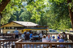 A restaurant or other place to eat at Russian River Camping Resort Cottage 7