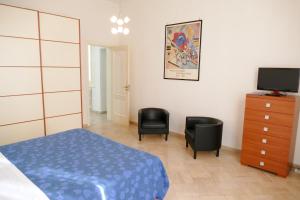 TV a/nebo společenská místnost v ubytování Visa Residence