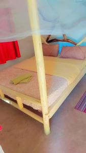 a pair of bunk beds under a tent at Essie Rovers Camp in Talek