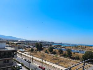 a view of a city from a building at GLS Priamos in Piraeus