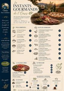 a menu for a restaurant with a table with food at Oasis Des Corbières in Boutenac