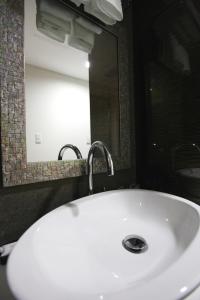 Koupelna v ubytování Eins Hotel