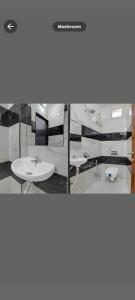a bathroom with two sinks and a toilet at Accuotel Hotel Perfect in Indore