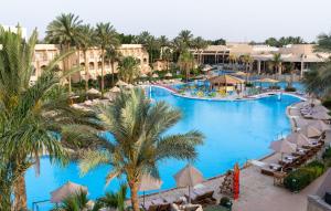 an overhead view of a swimming pool at a resort at PLM hotel Prima Life Makadi in Hurghada +43 photos