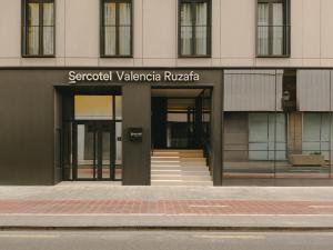 a building with the entrance to a building at Sercotel Valencia Ruzafa in Valencia