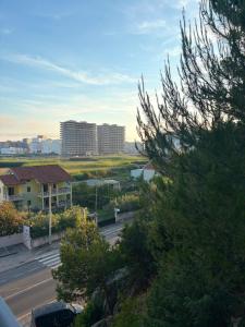 a view of a city street with buildings in the background at Hotel Bar Restaurant Riviera in Shëngjin
