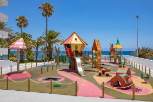 a playground at the beach with a slide at SOL by Meliá Lanzarote All Inclusive in Puerto del Carmen