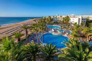 an aerial view of a resort with a beach at SOL by Meliá Lanzarote All Inclusive in Puerto del Carmen