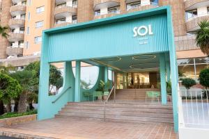 a blue building with a soo sign on it at SOL by Meliá Arona Tenerife in Los Cristianos
