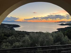 a view of the ocean from a bridge at villa amouso in Évyiros +3 photos