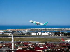 an airplane is taking off from an airport at SWEET HOME SUiTE HOTEL in Trabzon