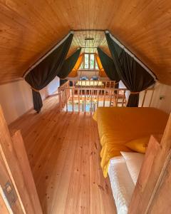 an overhead view of a room with a bed and a table at Love Corner in Batumi