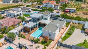 an aerial view of a house with a pool at Villa Vie Luxury Retreat in Blagaj