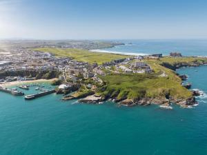 an aerial view of a small island in the ocean at Atlantic Hotel Newquay in Newquay