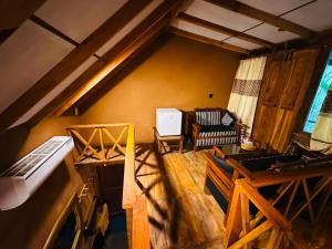 a view of a living room with an attic at Ama Eco Lodge in Sigiriya