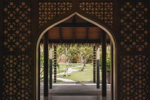 an entrance to a building with an open door at Meliá Whale Lagoon Maldivas in Fenfushi