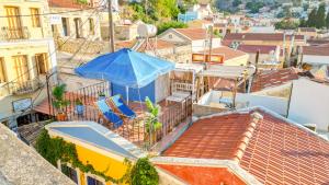 an aerial view of a city with buildings at Kali Strata 2 - Downtown in Symi +15 photos