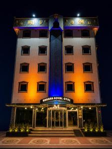 a building with a tower with a blue light on it at Ankara Royal Hotel in Ankara