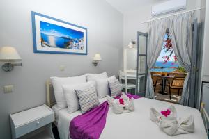 Llit o llits en una habitació de Nostos Beach