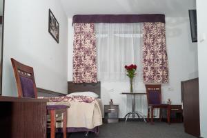 a hospital room with a bed and a window at Hostel Evotel in Zielonka +78 photos