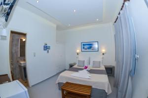 Llit o llits en una habitació de Nostos Beach