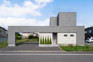 a house with trees on the side of it at The Prestige in Asahikawa +48 photos