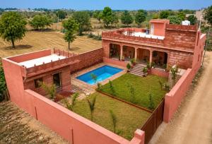an aerial view of a house with a swimming pool at Nova Heaven Villa in Daijar