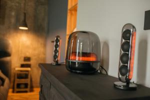a glass bowl with a red light on top of a counter at RAC by Zodiac Resort in Ceraşul