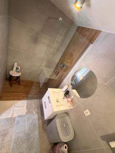 an overhead view of a bathroom with a shower at Dom nad jeziorem Krasne in Krasne +11 photos