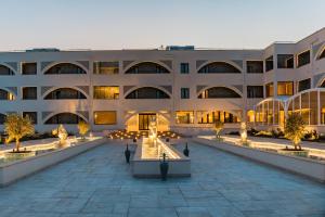 an exterior view of a building with a courtyard at CDSHotels Le Castella - Ninfe Saracene in Le Castella