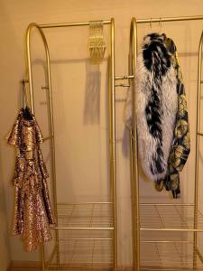 a shower stall with a white and black animal fur at Newly renovated Boutique Hotel Giulia Slow Residence in Velden am Wörthersee