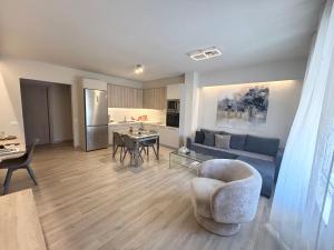 a living room with a couch and a table at Casa Do Ma Ni, Sitia in Sitia +53 photos