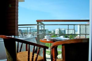 En balkon eller terrasse på APK Resort