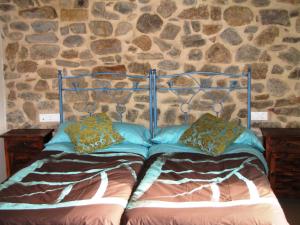 Postel nebo postele na pokoji v ubytování Casa Rural La Altanera