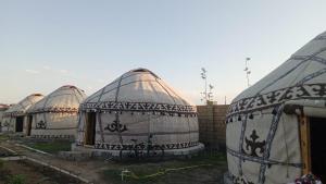 a row of domes sitting next to each other at Ак кайын in Chok-Tal