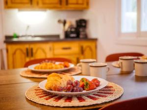 a table with two plates of food on it at Chic Shack with spa - near Massif Charlevoix & MSA in Saint-Tite-des-Caps