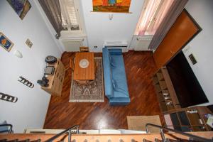 an overhead view of a room with a table and chairs at Dimora RAVENNA CORTE CHARME Diaz in Ravenna