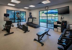 a gym with several exercise equipment in a room at SpringHill Suites Pittsburgh Mills in Tarentum