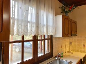 Kuchyň nebo kuchyňský kout v ubytování Holiday Home Sea Front + 60 fotografií
