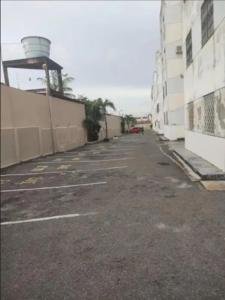 an empty parking lot next to a building at AbaHome Paiva in Cabo de Santo Agostinho