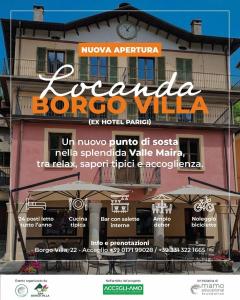 a sign for a restaurant on the side of a building at Rifugio Escursionistico Locanda Borgo Villa in Acceglio