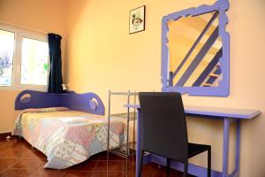 Postel nebo postele na pokoji v ubytování Albergue Finca El Mazo