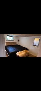 a bedroom with two beds in a room at Casa Bonita helt ny lejlighed med eget toilet in Hjørring