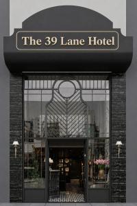 a store front with a sign for the lane hotel at The 39 Lane Hotel Hanoi in Hanoi