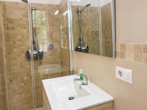 a bathroom with a sink and a shower at Riviera AlbaChiara B&b in Anzio +3 photos