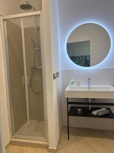 a bathroom with a shower and a sink at Casa Acquarello in Savona +20 photos