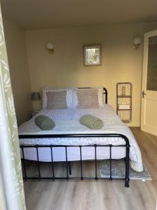 a bed in a room with a bed frame at Apartment in Constantine in Constantine