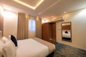 a hotel room with a bed and a window at AlQasr - Almansak in Abha +17 photos