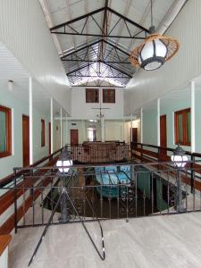 a large room with a swimming pool in a building at Andrea's hays in Kobuleti